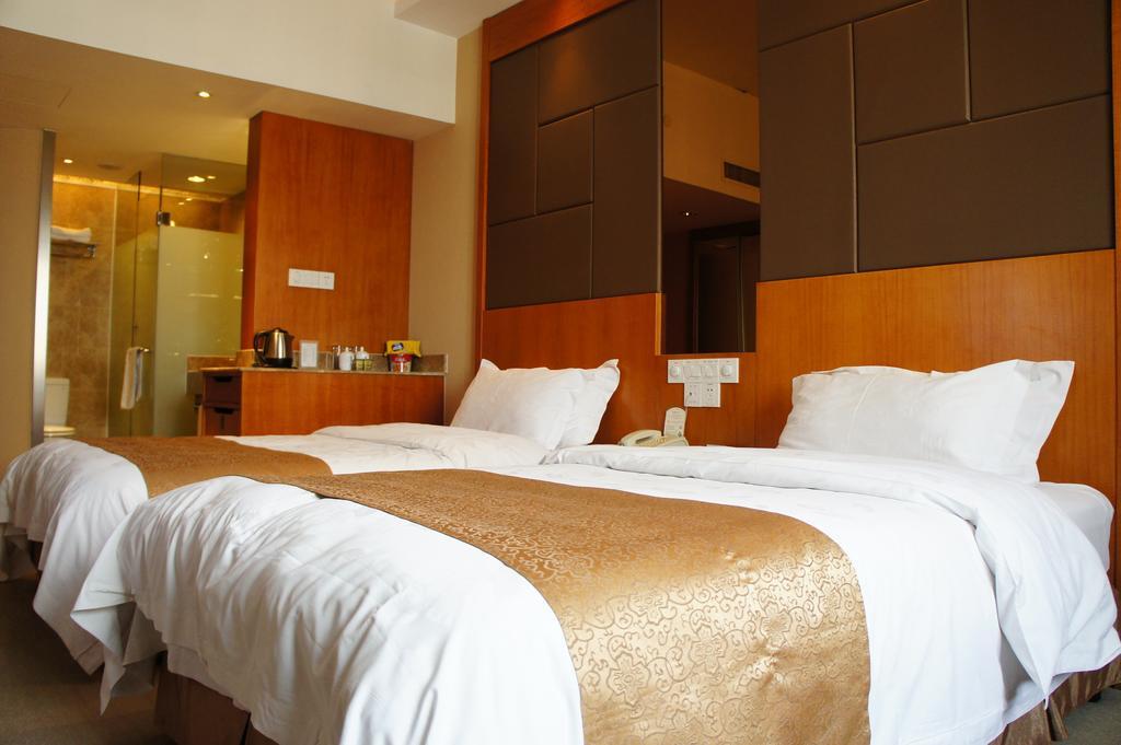 Oriental Hotel Tong Xiang Jiaxing Oda fotoğraf