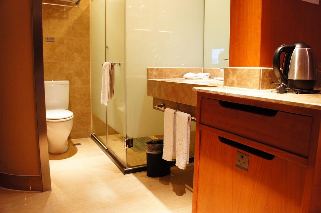 Oriental Hotel Tong Xiang Jiaxing Oda fotoğraf